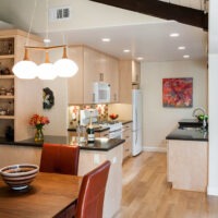 Transitional Kitchen Design with Black Countertop