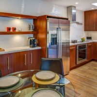 Gilmans Kitchens and Baths Contemporary Brown Kitchen Large View