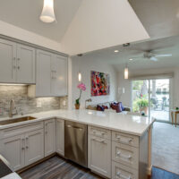 Transitional White Kitchen with White Quartz Countertop