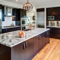 Dark Kitchen Cabinets and Granite Kitchen Island Top
